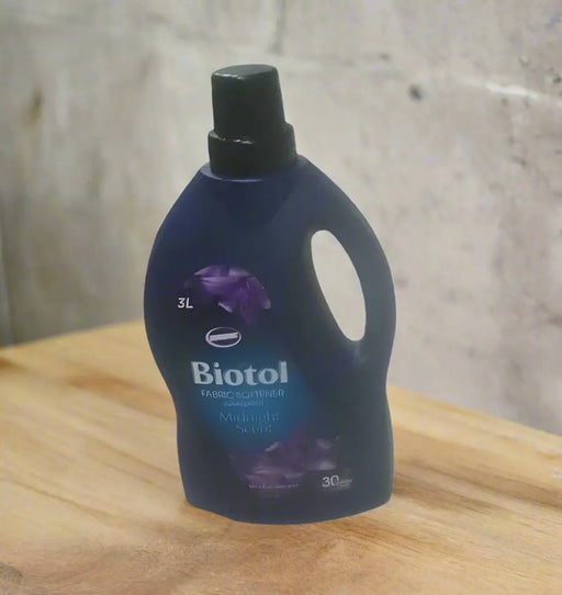 Biotol laundry detergent bottle on a tiled floor