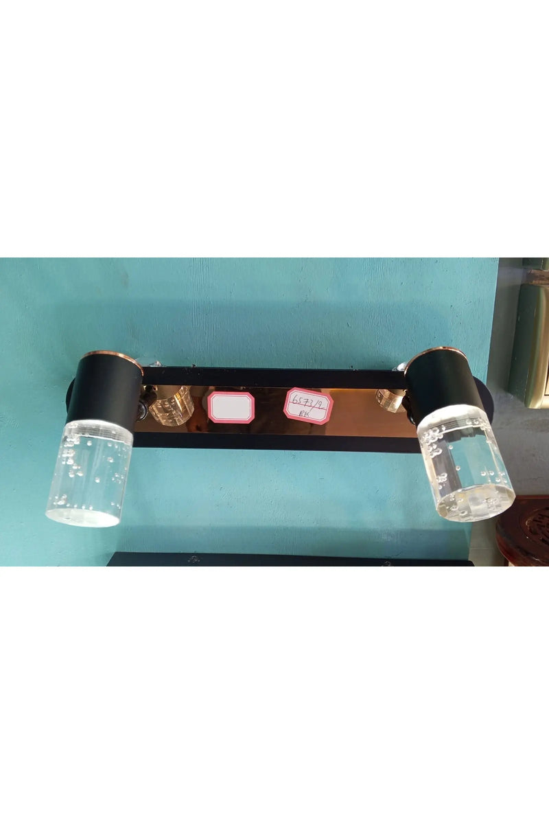 Black and rose gold wall-mounted light fixture Murukali.com