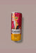 Red and yellow can of Gataó wine held by a hand in a store setting
