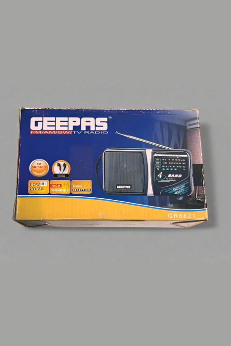 Hand holding a GEOPAS product box on a tiled floor