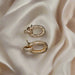 Luxe Gold Oval Drop Earrings with Diamond Embellishments Maman Fatu
