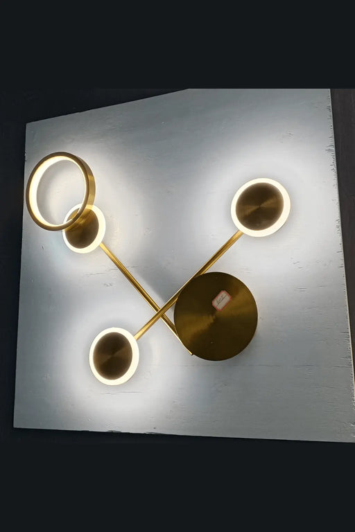 Modern Gold Wall Lamp with Circular LED Design murukali.com