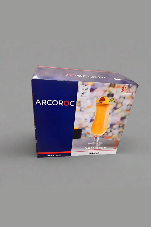 Arcoroc glass packaging with a colorful drink illustration on a tiled floor.