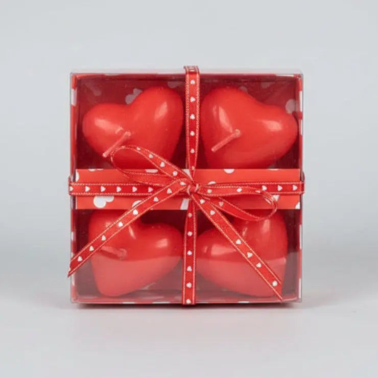 Set von herzförmigen Teelichtern in Geschenkbox