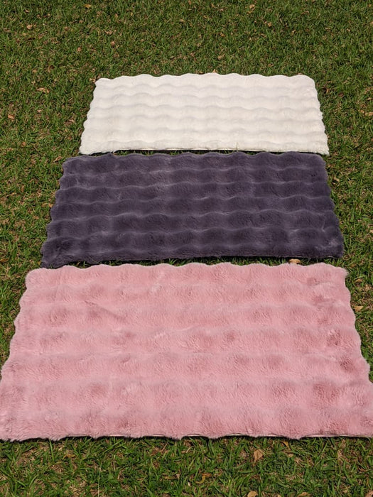 Pink Faux Fur Area Rug with Wavy Edge Design