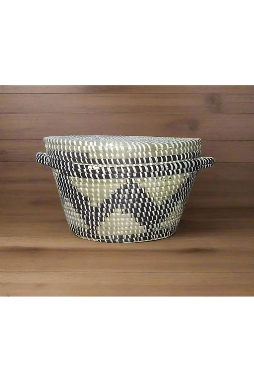 Handheld woven basket with a checkered pattern in a casual setting