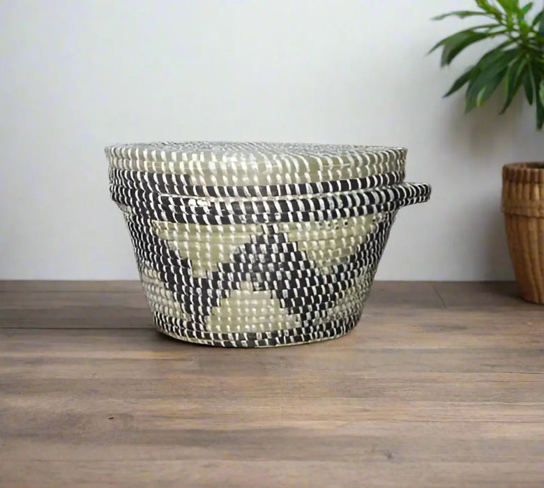 Handheld woven basket with a lid in a store setting